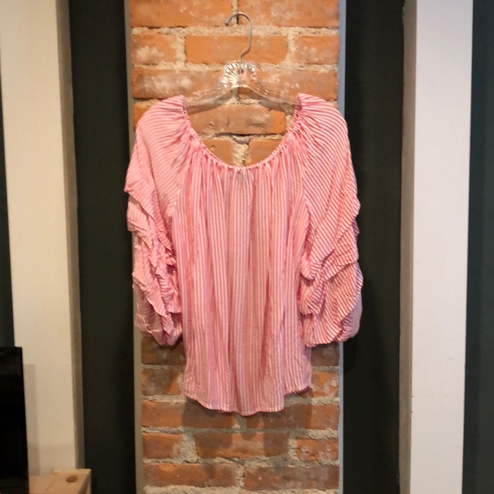 A beautiful light and airy top .